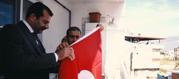 Başkan Işık’tan Akyol Ailesine Bayrak Hediyesi fotoğraf 2