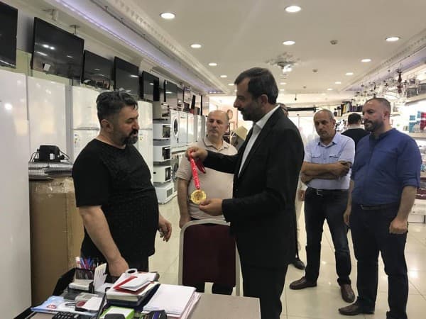 BAŞKAN IŞIK’TAN İLÇE HALKINA “MİNNETTARLIK MADALYASI” fotoğraf 7