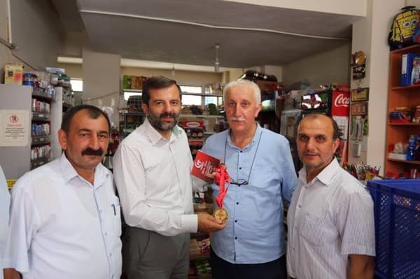 BAŞKAN IŞIK’TAN İLÇE HALKINA “MİNNETTARLIK MADALYASI” fotoğraf 14