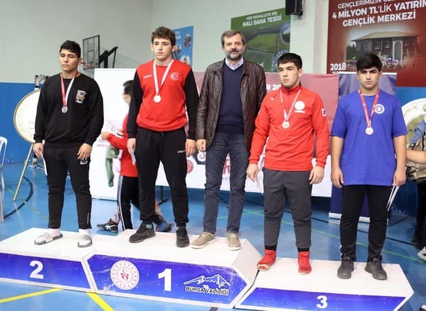 GELENEKSEL ŞEHİT CÜNEYT YILDIZ GÜREŞ TURNUVASI GERÇEKLEŞTİ fotoğraf 1